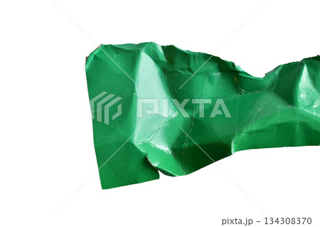 Decorative background made of torn crumpled cardboard of green color. 134308370