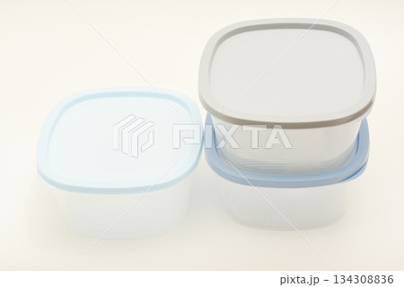 Large containers for food. Three plastic containers with a blue lid for food on a white background. 134308836