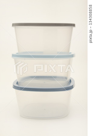 Large containers for food. Three plastic containers with a blue lid for food on a white background. 134308858