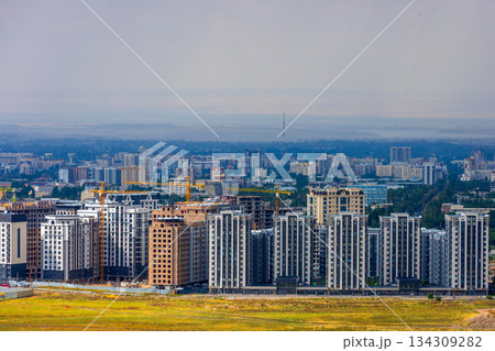 New multistory residential buildings in Bishkek city at cloudy summer day in Kyrgyzstan 134309282
