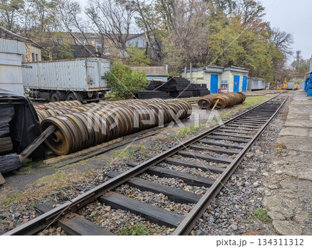 An open-air warehouse for train car wheels An open-air warehouse for train car wheels 134311312
