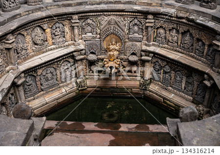 The holy carved sunken water tank (named Tusha Hiti) in royal palace of Patan Durbar square was used by the king for ritual ablutions.  134316214