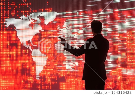 Visionary CEO Delivering Keynote Presentation with Digital World Map Background Visionary CEO Delivering Keynote Presentation with Digital World Map Background 134316422