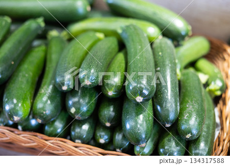 Green zucchini in shop window Green zucchini in shop window 134317588