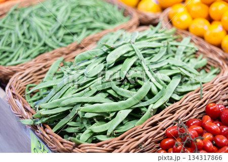 Green string beans in a supermarket drawer 134317866