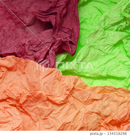 creative combination of three colors of crumpled paper purple, lime green, and peach creative combination of three colors of crumpled paper purple, lime green, and peach 134318298