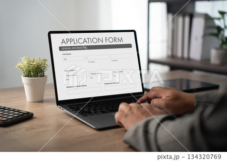 man working on laptop Online application form hiring employment searching job on website recruitment Employment Concept 134320769