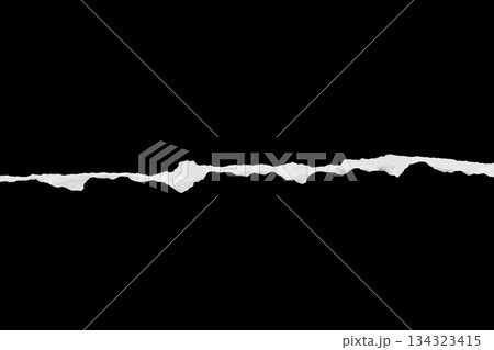 Ripped torn paper edges isolated on black background Ripped torn paper edges isolated on black background 134323415