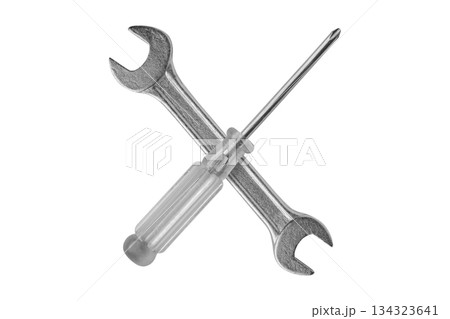 screwdriver and wrench isolated on white background close up 134323641