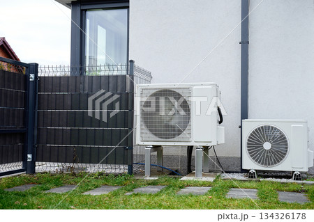 Outdoor heat pump unit with rotating fan blades Outdoor heat pump unit with rotating fan blades 134326178