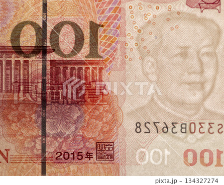 100 yuan in a bright light from behind, a close-up of Chinese money with watermarks and obverse and reverse simultaneously in a bright light from behind 134327274