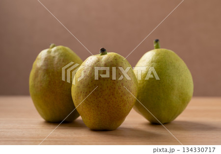 Fresh pear on wooden background 134330717