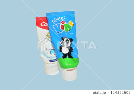 Two opened tubes of children's toothpaste. Two opened tubes of children's toothpaste. 134331605