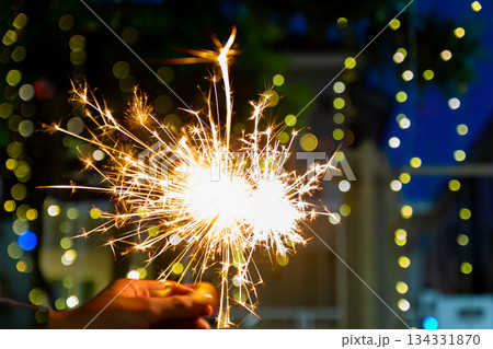 beautiful bokeh of christmas sparkler, holiday background and happy new year creating festive atmosphere for celebration or holiday event beautiful bokeh of christmas sparkler, holiday background and happy new year creating festive atmosphere for celebration or holiday event 134331870