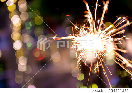beautiful bokeh of christmas sparkler, holiday background and happy new year creating festive atmosphere for celebration or holiday event beautiful bokeh of christmas sparkler, holiday background and happy new year creating festive atmosphere for celebration or holiday event 134331873