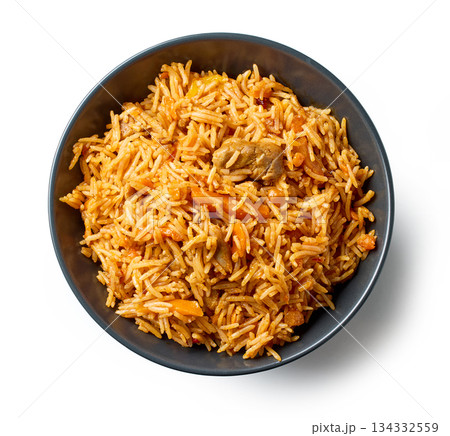 bowl of spicy rice with chicken meat and carrots 134332559