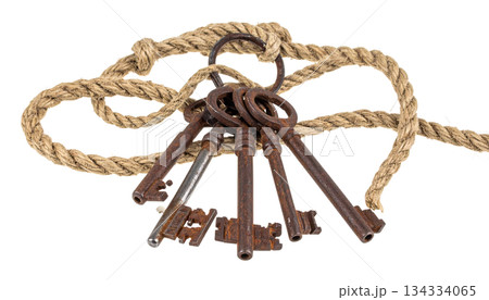 Old key chain on a ring, isolated on a white background. 134334065