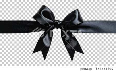 An elegant golden silk bow is an isolated decoration on a white background. An elegant golden silk bow is an isolated decoration on a white background. 134334195