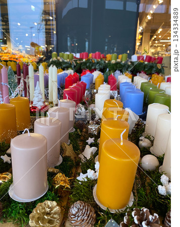 Vertical Close-up of Festive Candles and Ornaments for Holiday Season Decoration. Vertical Close-up of Festive Candles and Ornaments for Holiday Season Decoration. 134334889