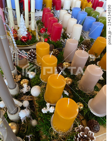 Lots of Christmas candles at the market. Holiday shopping Lots of Christmas candles at the market. Holiday shopping 134334890