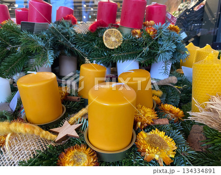 Lots of Christmas candles at the market. Holiday shopping Lots of Christmas candles at the market. Holiday shopping 134334891