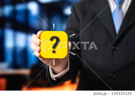 Businessman and the question mark. A survey of entrepreneurs. Business sentiment, uncertainty. Market research, startup, economic confidence analysis and innovation planning. 134335120