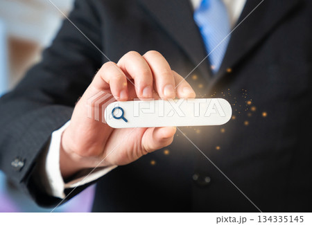 Businessman and the search bar. Online advertising and search engine targeting. Work online. Order online. Digital presence drives sales. Search visibility connects brands with customers Businessman and the search bar. Online advertising and search engine targeting. Work online. Order online. Digital presence drives sales. Search visibility connects brands with customers 134335145