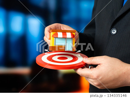 Store and target. Concept of the business's target audience and optimal retail placement for customer attraction. Smart location strategy increases foot traffic, visibility and competitive advantage. Store and target. Concept of the business's target audience and optimal retail placement for customer attraction. Smart location strategy increases foot traffic, visibility and competitive advantage. 134335146