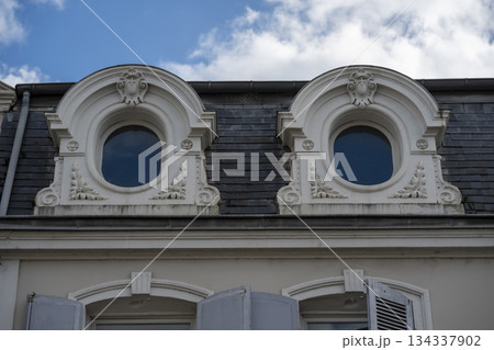 Elegant architectural details on a historic building in a cityscape 134337902