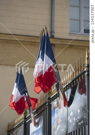 French flags waving proudly at the Prefecture in France under a bright sky 134337907