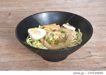 Tonkotsu Chashu ramen orJapanese yellow noodles topping slice braised pork with boiled egg in Miso soy sauce on bowl 134339095
