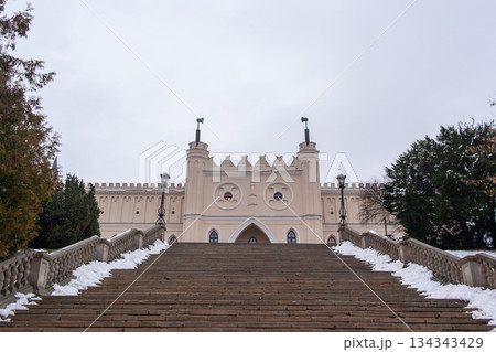 Front of the historic castle in Lublin in winter scene with snow and cloudy sky Front of the historic castle in Lublin in winter scene with snow and cloudy sky 134343429