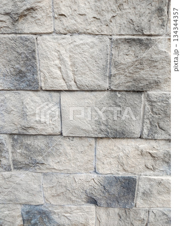 Stone wall texture close up light gray masonry vertical Stone wall texture close up light gray masonry vertical 134344357