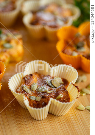 Rustic homemade muffins made from cottage cheese and seeds Rustic homemade muffins made from cottage cheese and seeds 134344501