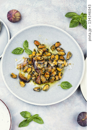 Steamed mussels and figs. 134346843