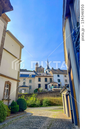 Esch-sur-Sure, Wiltz, Grand-Duche de Luxembourg, September 07, 2025, Sunlit courtyard overlooking 134346950
