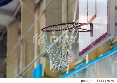 basketball hoop in a gym basketball hoop in a gym 134347079