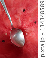 Watermelon background with a silver spoon. 134348589