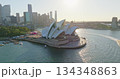 Sydney Opera House at Circular Quay, modern urban cityscape buildings and Sydney Harbor Bridge in warm sunset light. Iconic Australia main landmark travel destination background. Aerial drone panorama Sydney Opera House at Circular Quay, modern urban cityscape buildings and Sydney Harbor Bridge in warm sunset light. Iconic Australia main landmark travel destination background. Aerial drone panorama 134348863