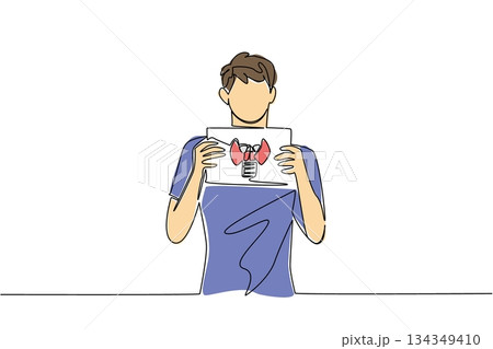 Continuous one line drawing a man in casual clothes holds a paper with a mockup of a thyroid gland with both hands. Therapy. Sickness. World Thyroid Day. Single line draw design vector illustration 134349410