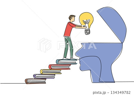 Single one line drawing a man walks carry a big lightbulb towards a silhouette of a head with an open top. Useful creative memory. National Creativity Day. Continuous line design graphic illustration 134349782