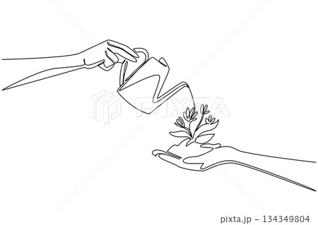 Single continuous line drawing hand holds a lump of soil with flowering plant and watering it with watering can. Symbol of cooperation. National Water a Flower Day. One line design vector illustration 134349804