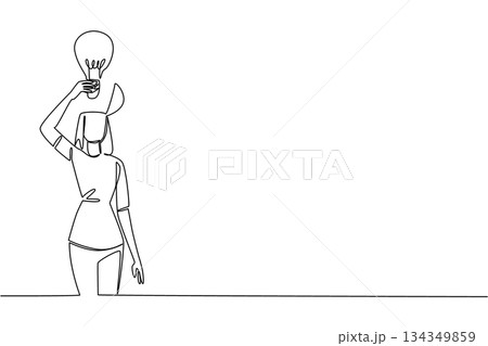 Single continuous line drawing a woman with head uncover and lifts a lightbulb above her head. Bringing out the harmony. Innovate. Smart. National Creativity Day. One line design vector illustration Single continuous line drawing a woman with head uncover and lifts a lightbulb above her head. Bringing out the harmony. Innovate. Smart. National Creativity Day. One line design vector illustration 134349859