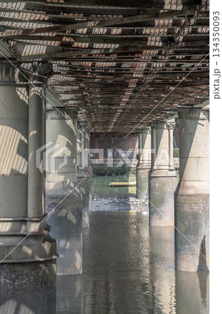 Under the Kew Railway Bridge or Strand-on-the-Green Railway Bridge (Lattice girder bridge). 134350093