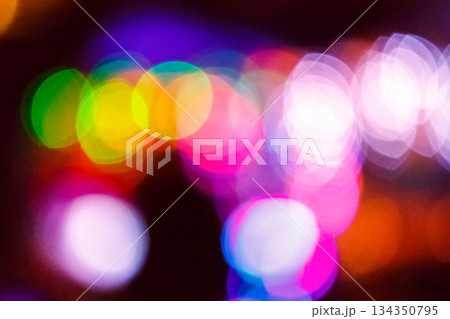 christmas tree bokeh lights. new year abstract background. decorated festive winter holiday backdrop. de focused urban landscape of uzhhorod dark street in glowing december garlands 134350795