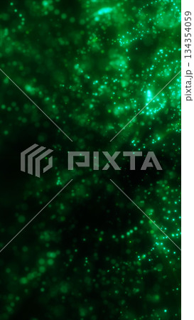Green glowing bokeh light particles floating in abstract depth field Green glowing bokeh light particles floating in abstract depth field 134354059