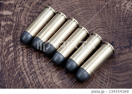 Old West Colt .45 caliber revolver cartridges 134354169