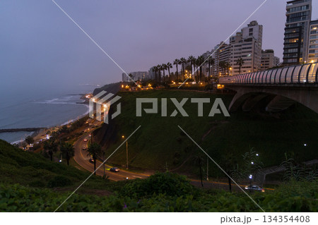 A city with a bridge over a body of water 134354408