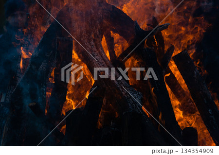 Beautiful fire flames on a campfire Beautiful fire flames on a campfire 134354909