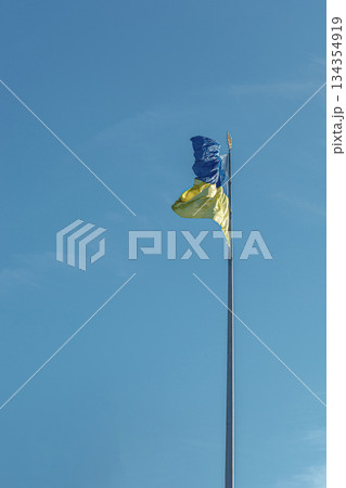 Ukrainian flag against the blue sky 134354919